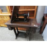 Singer sewing machine cabinet on cast iron treadle base