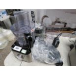 Unboxed Kenwood food processor together with bag of various attachments and three jug attachments