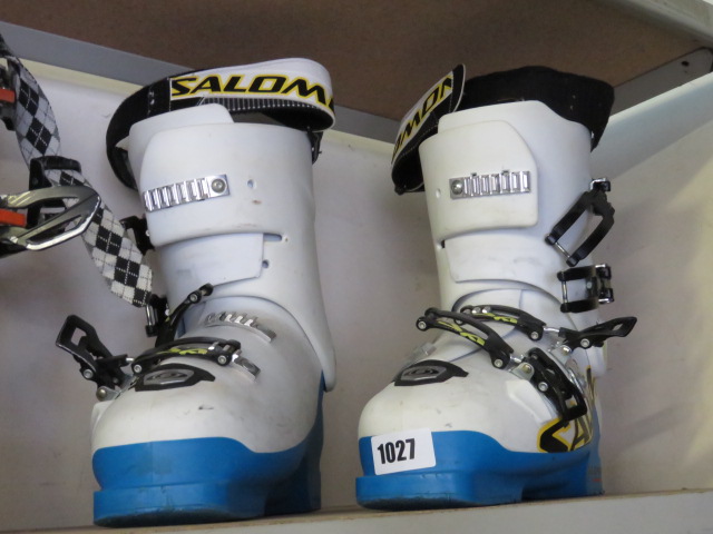 Pair of Solomon ski boots in blue and white