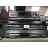 Technics stereo receiver, Panasonic DVD player, Samsung bluray player, and Panasonic VHS DVD player