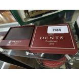 2 Dents Gents wallets, one black, one brown
