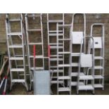 8 various size aluminium step ladders