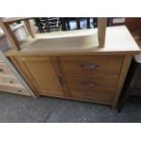Modern light oak sideboard with single cupboard and 3 drawers