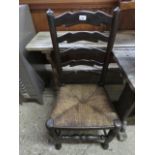 Dark oak ladder back rush seated dining chair
