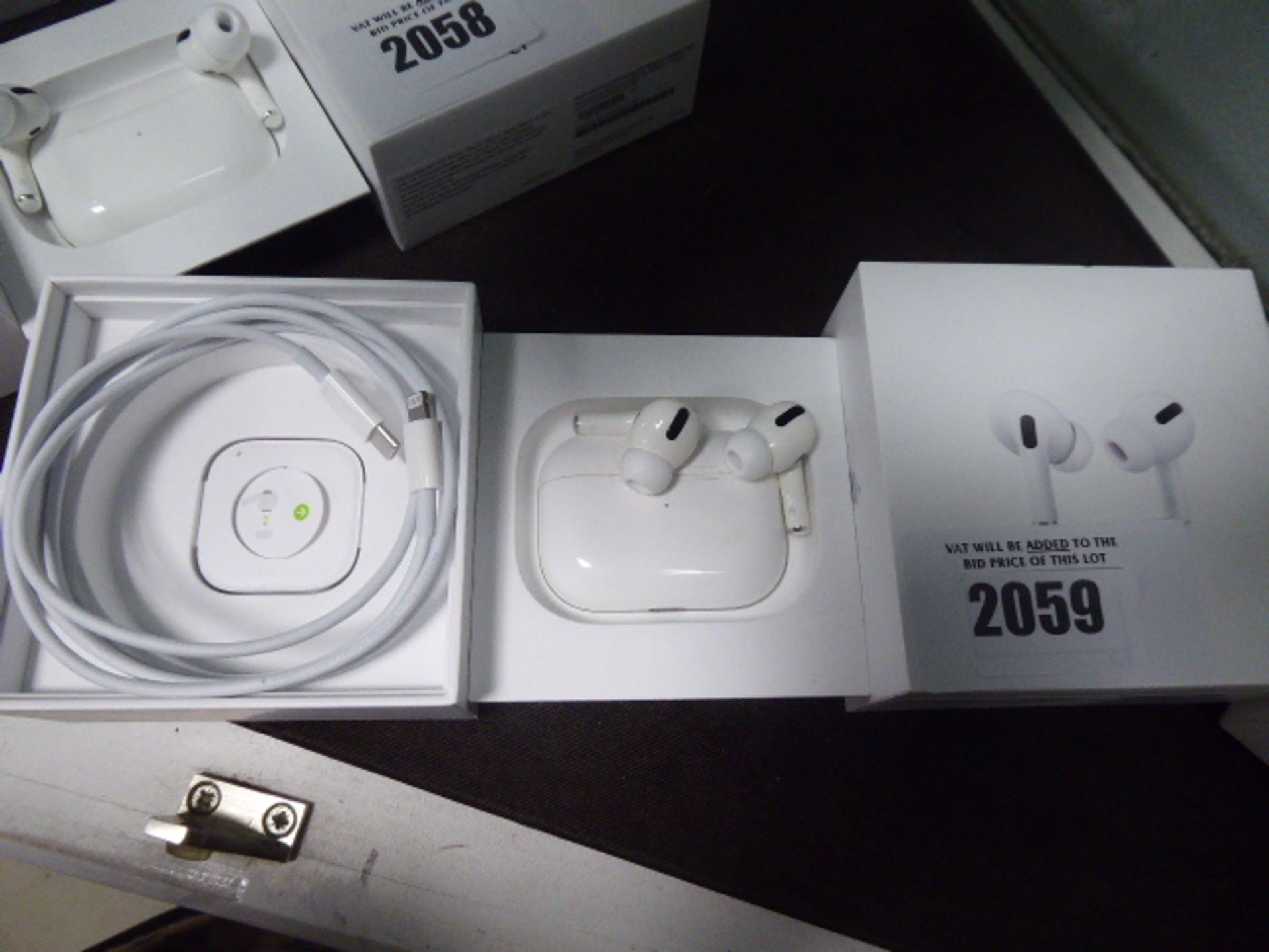 Apple airpods pro with wireless charging case, spare ear tips, charging cable and box