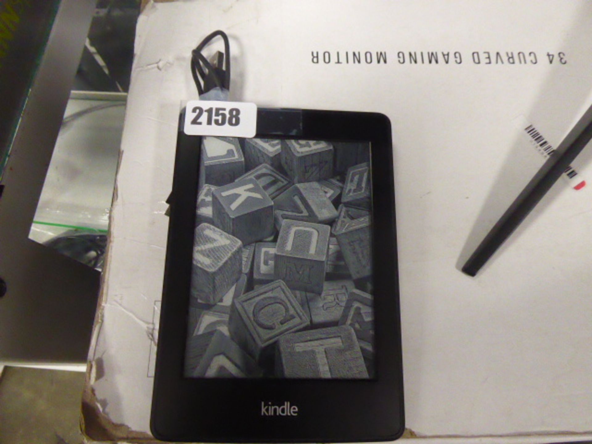 Amazon Kindle with charging cable