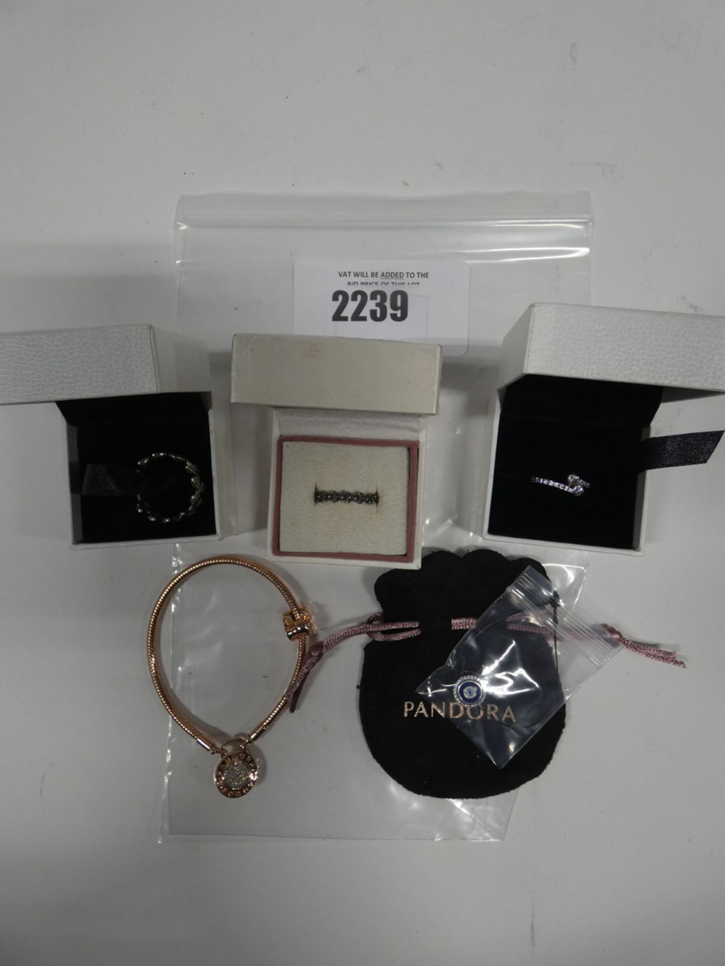 Consignment of Pandora jewellery; rings, charm and Rose Gold padlock bangle