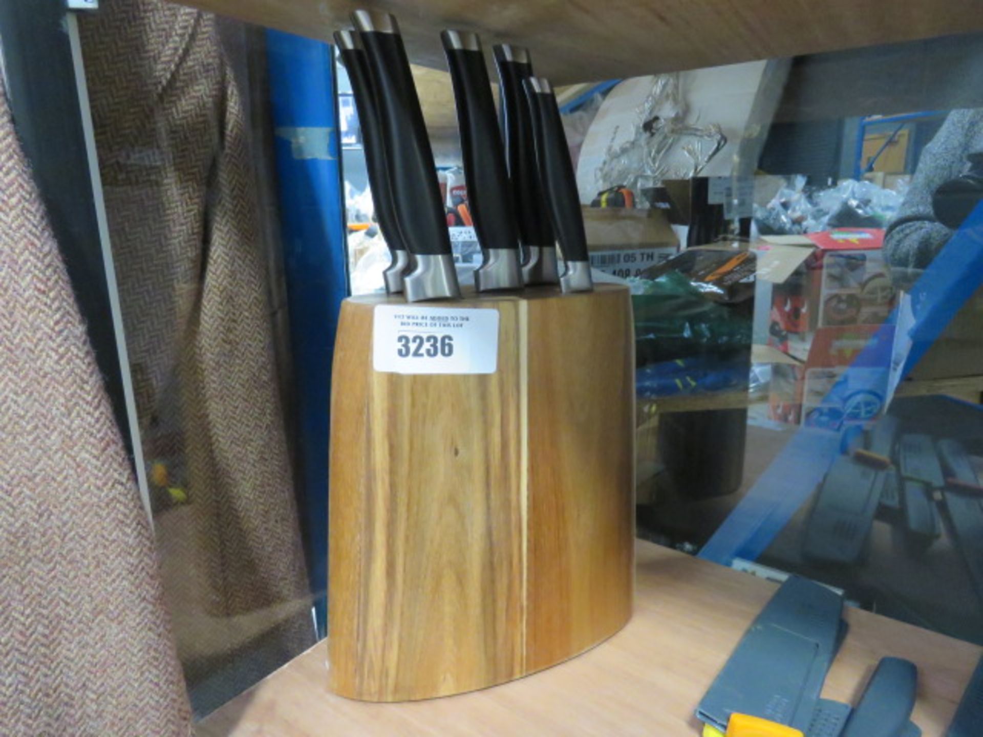 A wooden knife block and knife set