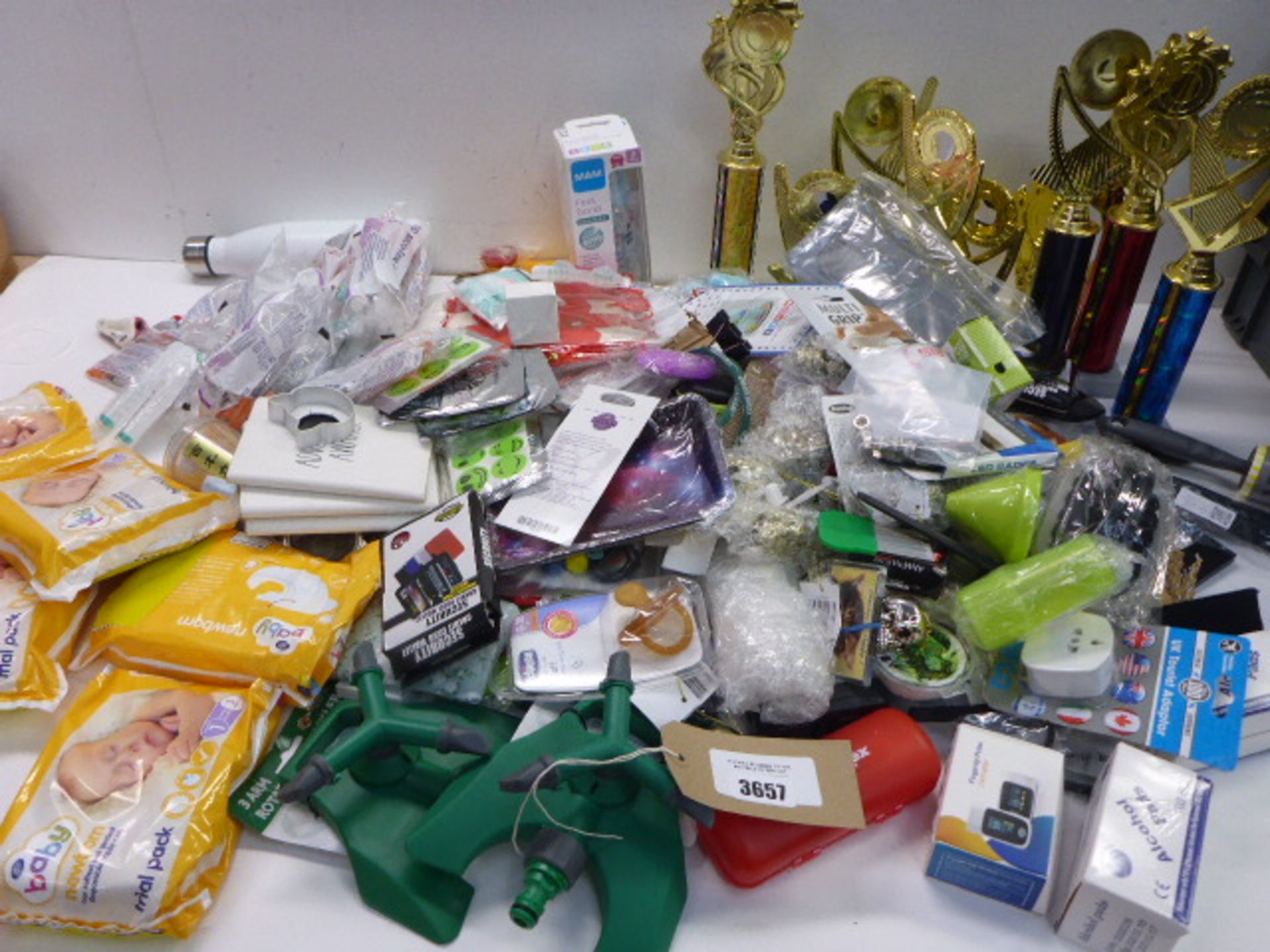 Large bag of household sundries, trophies, glue sticks, Venom extractor, Newborn nappies, garden