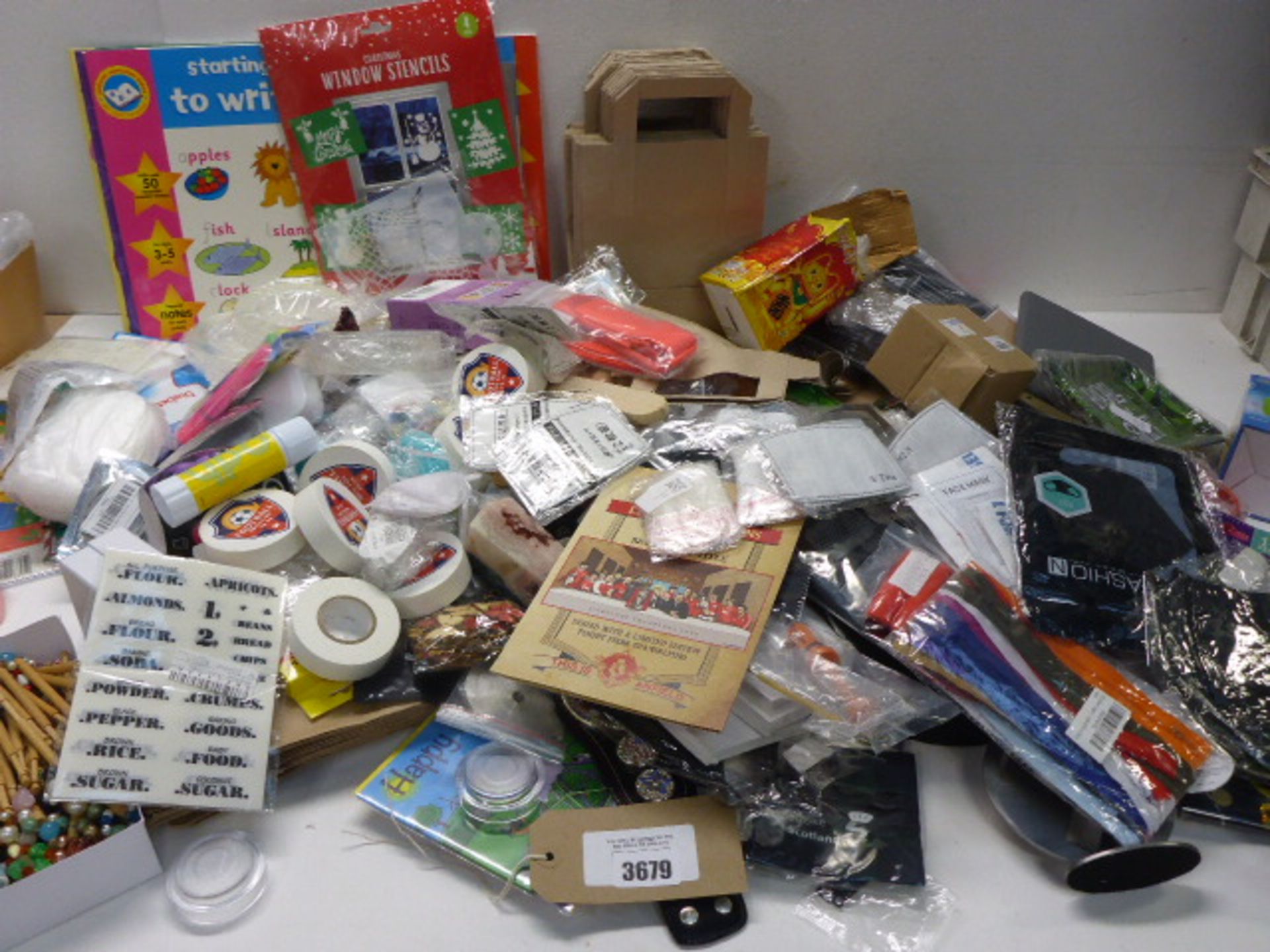 Large bag of assorted household sundries, lace bobbins, activity books, stationery, face masks,