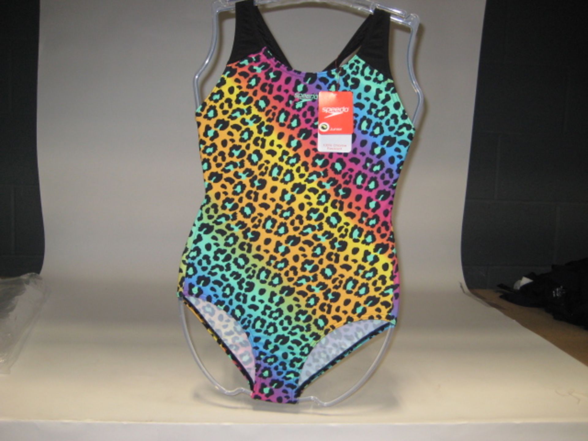 Approx 29 Speedo swimming costumes for juniors in an animal print rainbow fabric