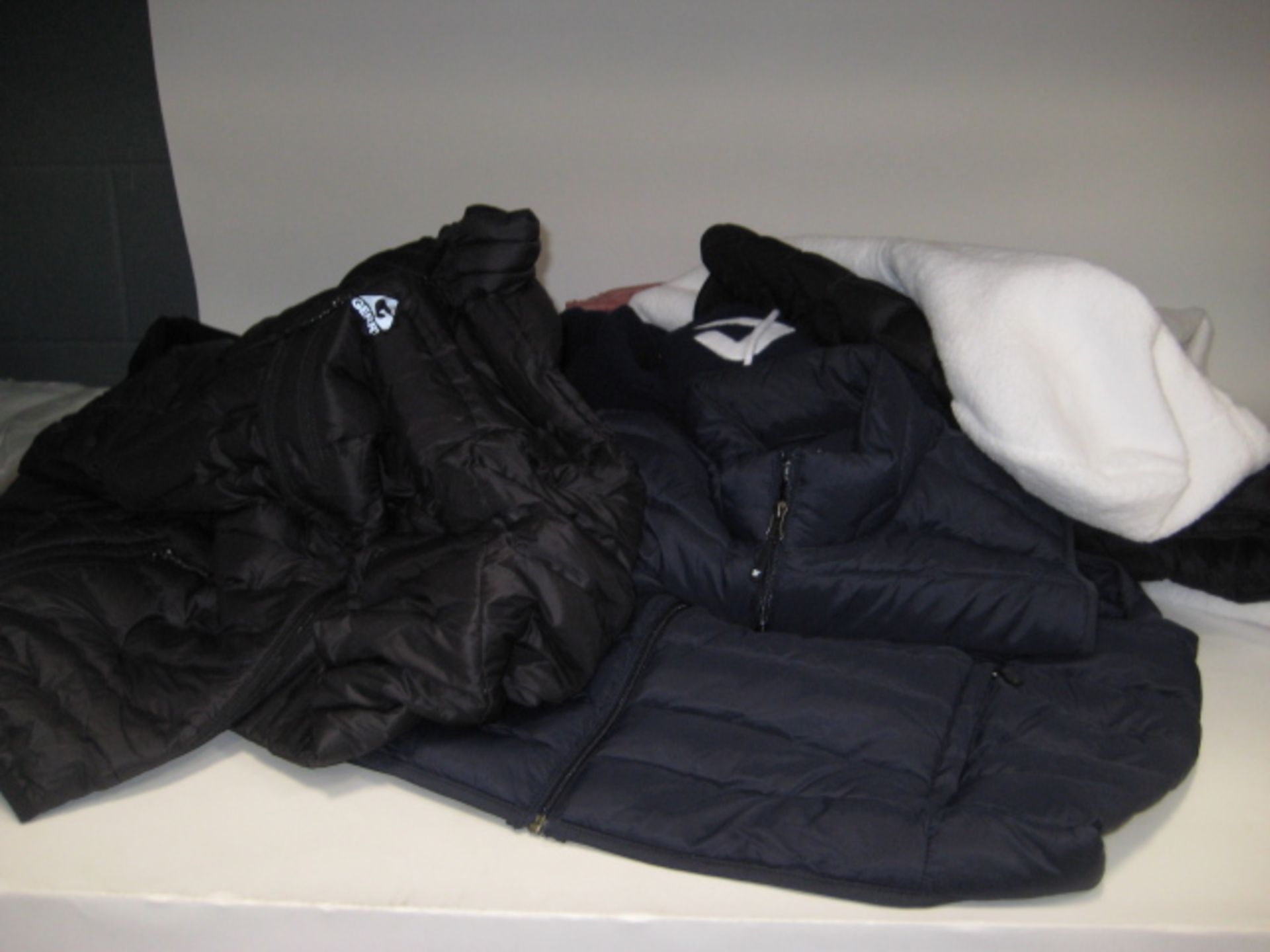 Approx 8 quilted and fleece jackets and gilets made by Gerry 32 degree heat, Fila, Kirkland, etc,