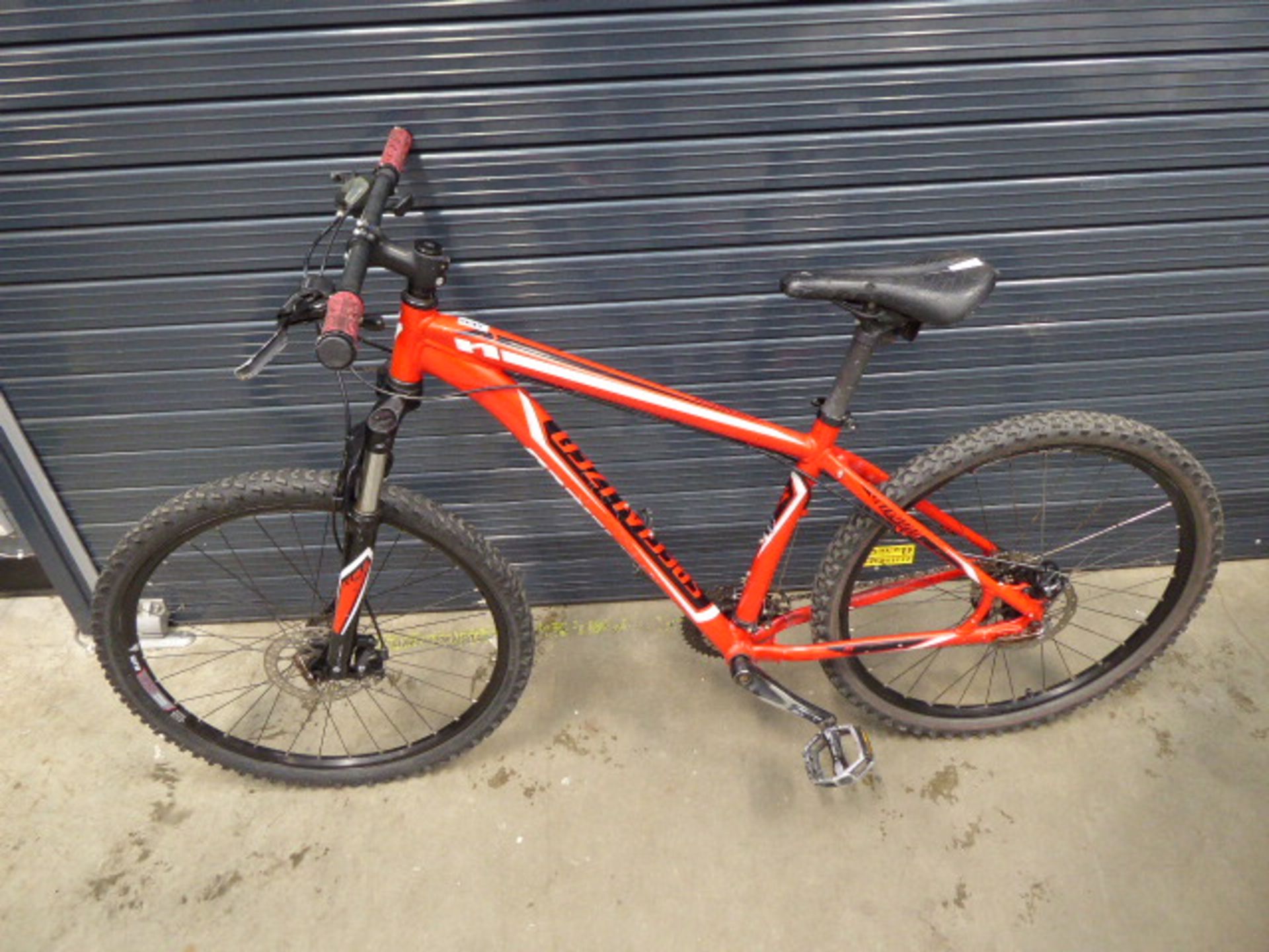 Red and white specialized gent's mountain bike