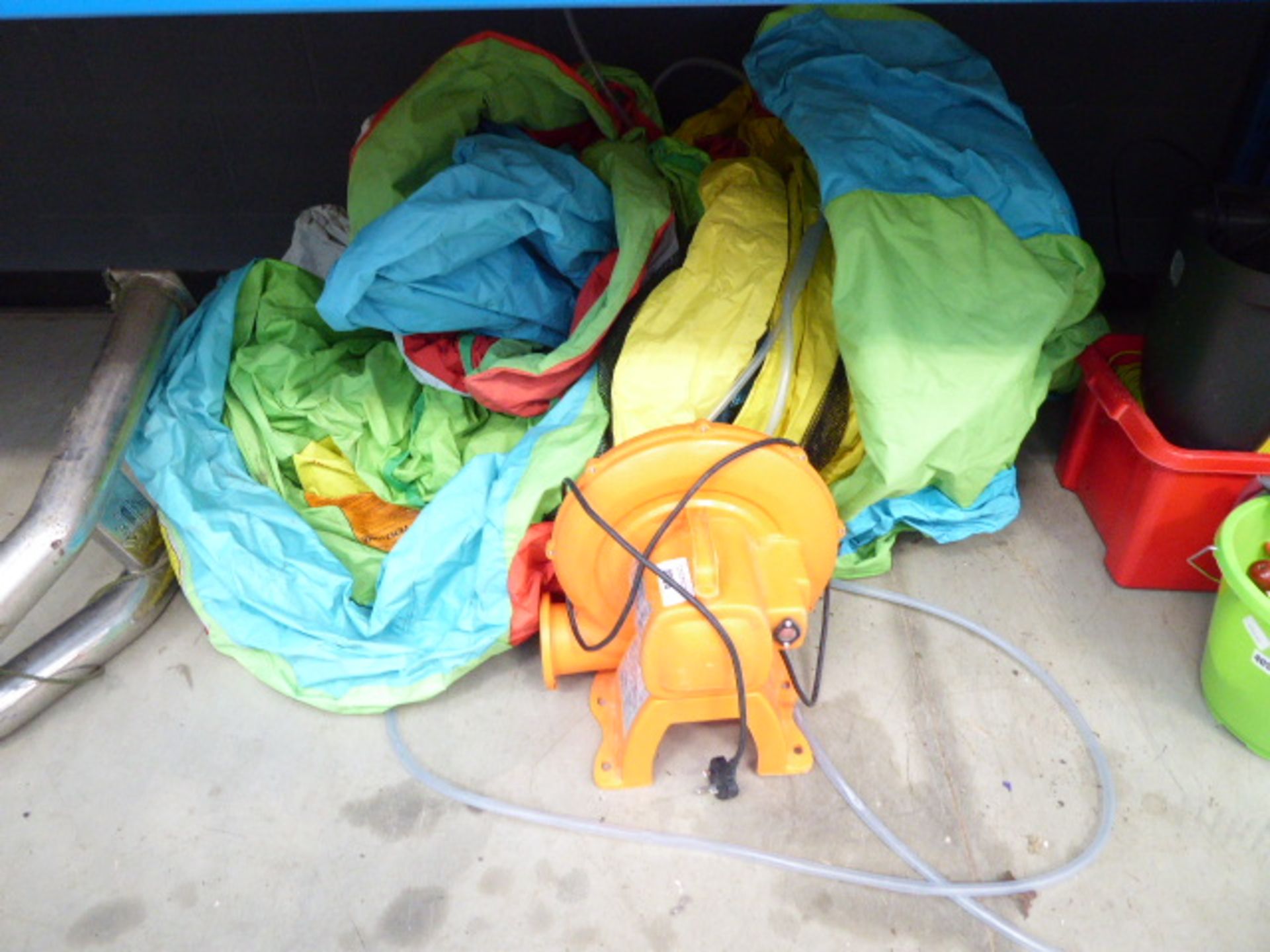 Flat pack bouncy castle with blower