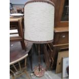 Turned teak floor lamp with shade