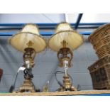 Pair of gold painted ornate table lamps with shades
