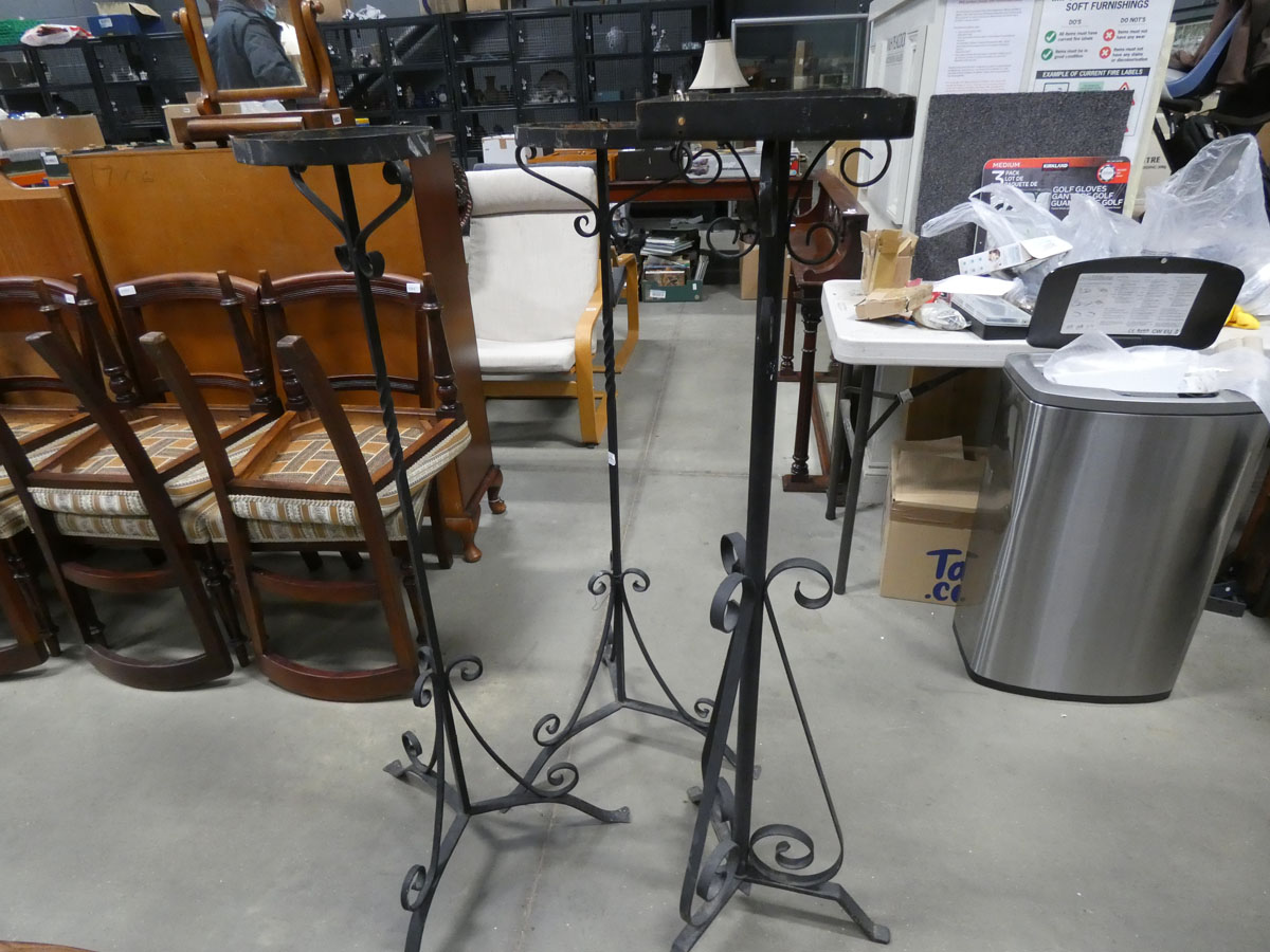Three wrought iron tripod plant stands