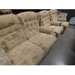 Brown floral fabric two seater sofa plus a pair of matching reclining armchairs