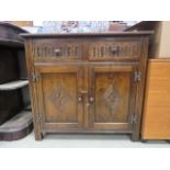 Dark oak sideboard, two drawers, two doors under