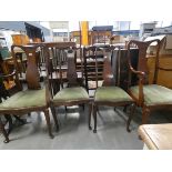 4 queen Anne style walnut dining chairs to include 2 carvers