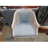 Painted cane armchair