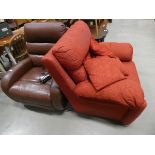 Red fabric armchair plus a brown leather effect electric reclining chair