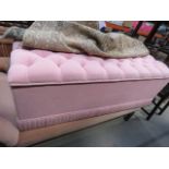 Pink fabric ottoman