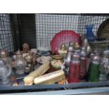 (003) A cage containing a collection of sugar shakers, general china, brushes and glassware