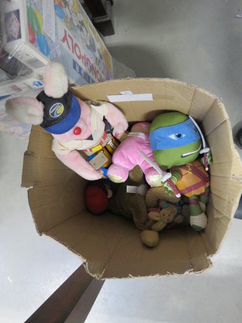 A box containing children's fluffy toys