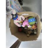 A box containing children's fluffy toys