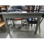 Grey painted metal industrial work table with single drawer