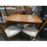Beech extending dining table plus four chairs