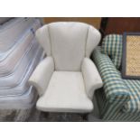 Oatmeal fabric wingback armchair