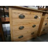 Satin walnut chest of three drawers