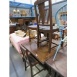 Dark oak drawer-leaf table plus four chairs with rexine seats