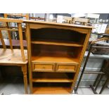 (21) Walnut effect open bookcase with two central drawers