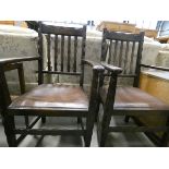 Pair of dark oak armchairs with rexine seats