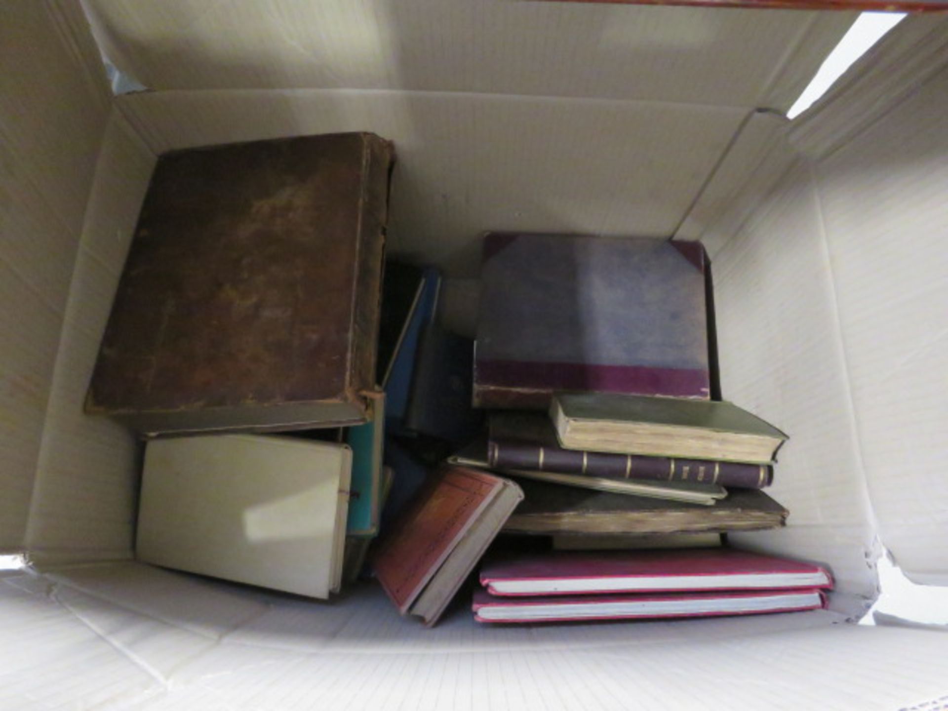 A box containing a quantity of reference books, to include: The World of Wonder, The Queen's Gift