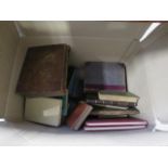 A box containing a quantity of reference books, to include: The World of Wonder, The Queen's Gift