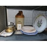 A flat iron, 2 quartz clocks, plus a stoneware flagon and a quantity of plates