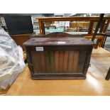 Victorian table top book rack with sliding door