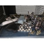 A cage containing loose and boxed cutlery, brass ornamental figures, plus silver plate