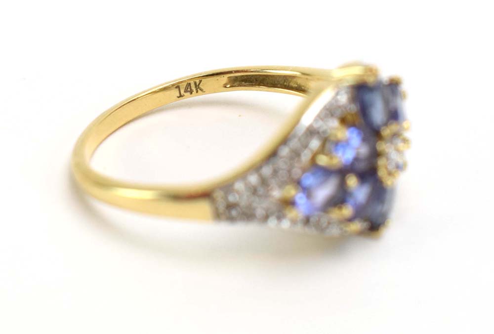 A 9ct yellow gold dress ring set pale blue stones and small diamonds in a flowerhead setting, - Image 11 of 12