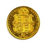 A Victorian shield back half sovereign dated 1887