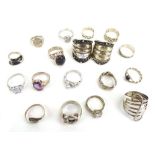 Eighteen silver and metalware dress rings of varying designs including niello decorated examples,