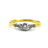 An 18ct yellow gold ring set brilliant cut diamond in an eight claw setting,