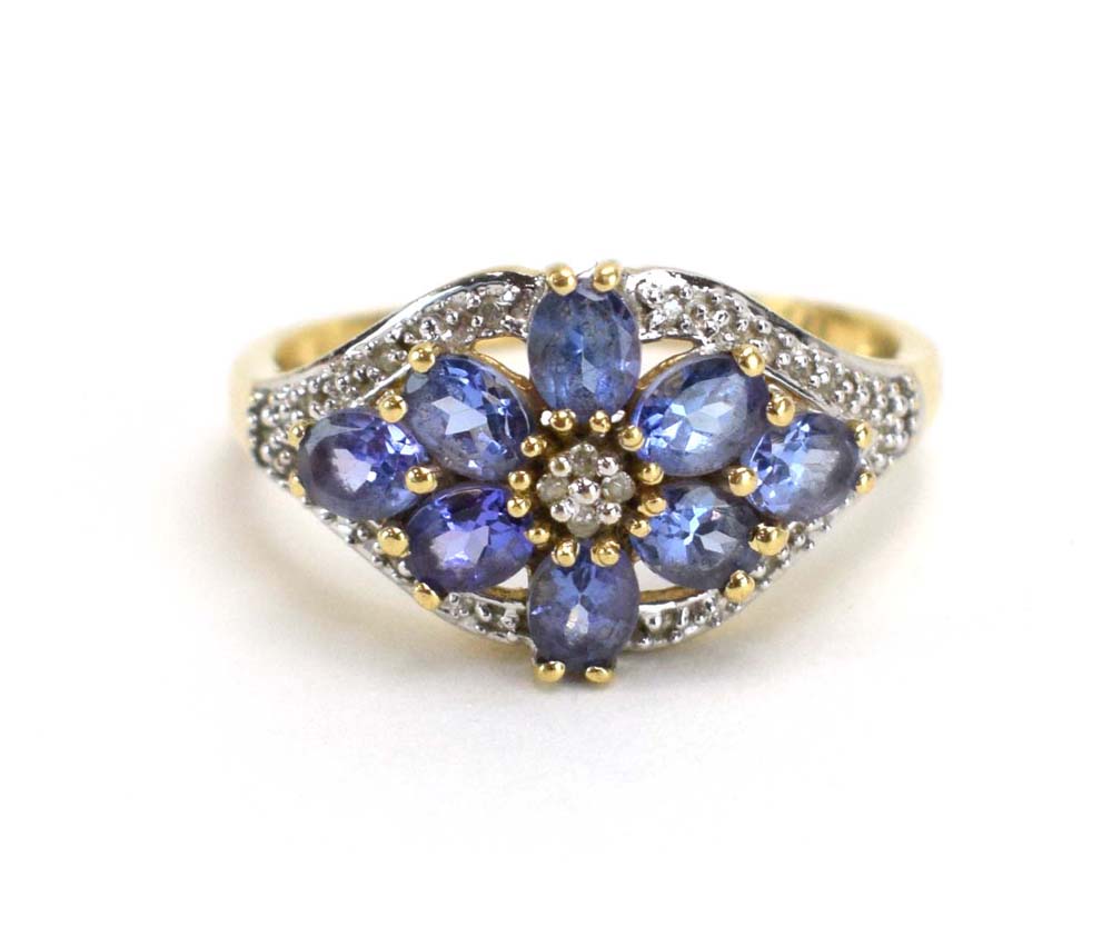 A 9ct yellow gold dress ring set pale blue stones and small diamonds in a flowerhead setting, - Image 10 of 12