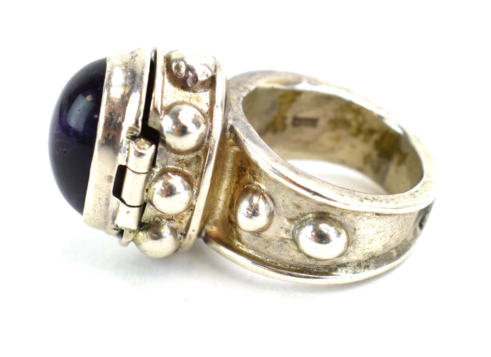 A late 20th century silver 'poison' ring set cabochon amethyst, maker PGW, London 1991, - Image 15 of 16