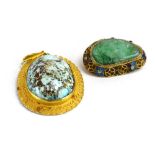 A Chinese export silver gilt brooch of teardrop form set carved green jade within an enamelled