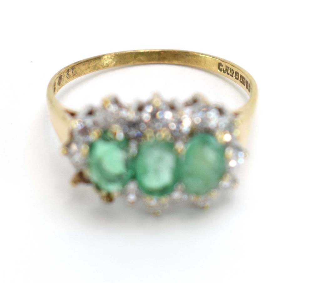 A 9ct yellow gold dress ring set pale blue stones and small diamonds in a flowerhead setting, - Image 4 of 12